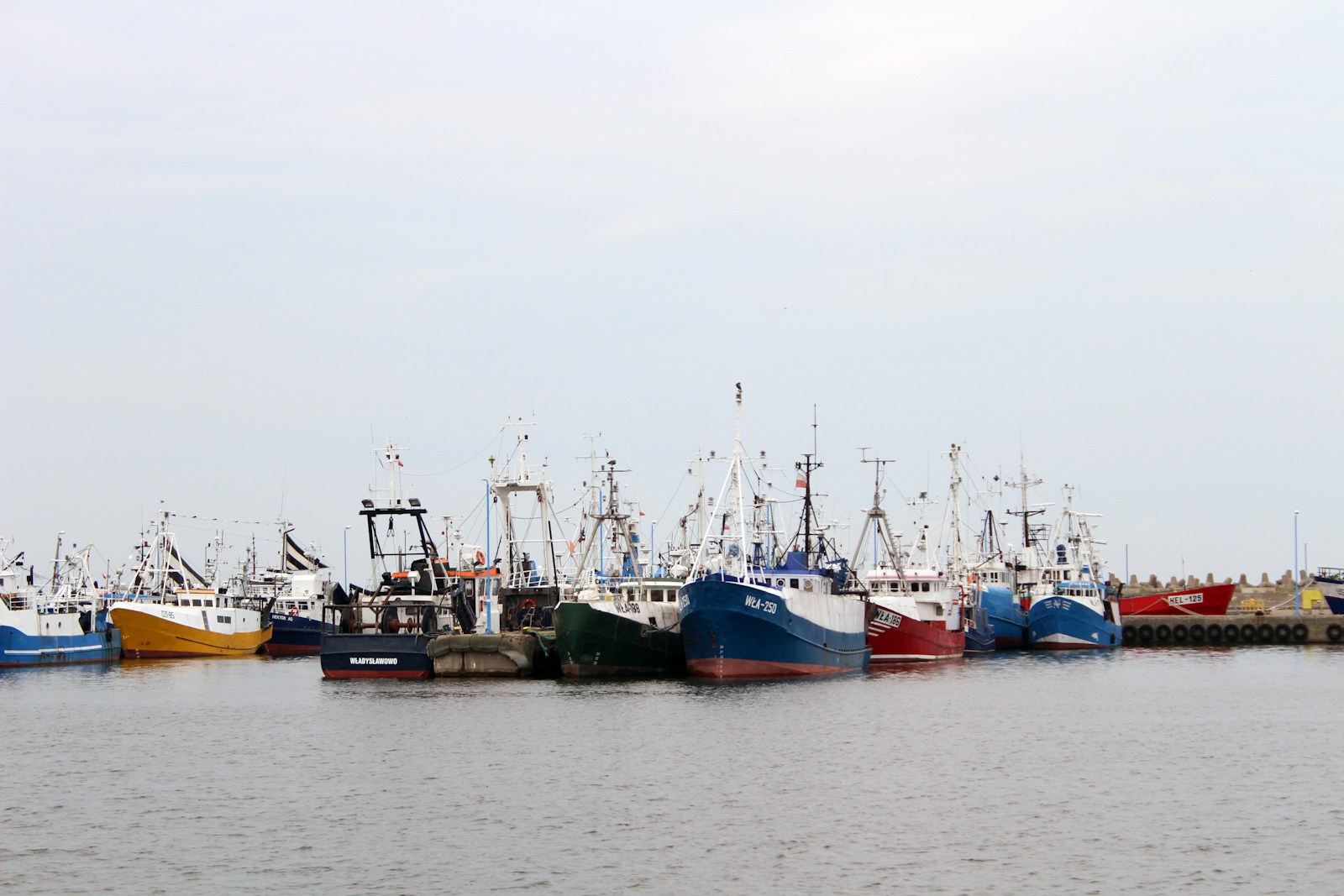 Photo by FOTOGRA A bunch of boats that are sitting in the water